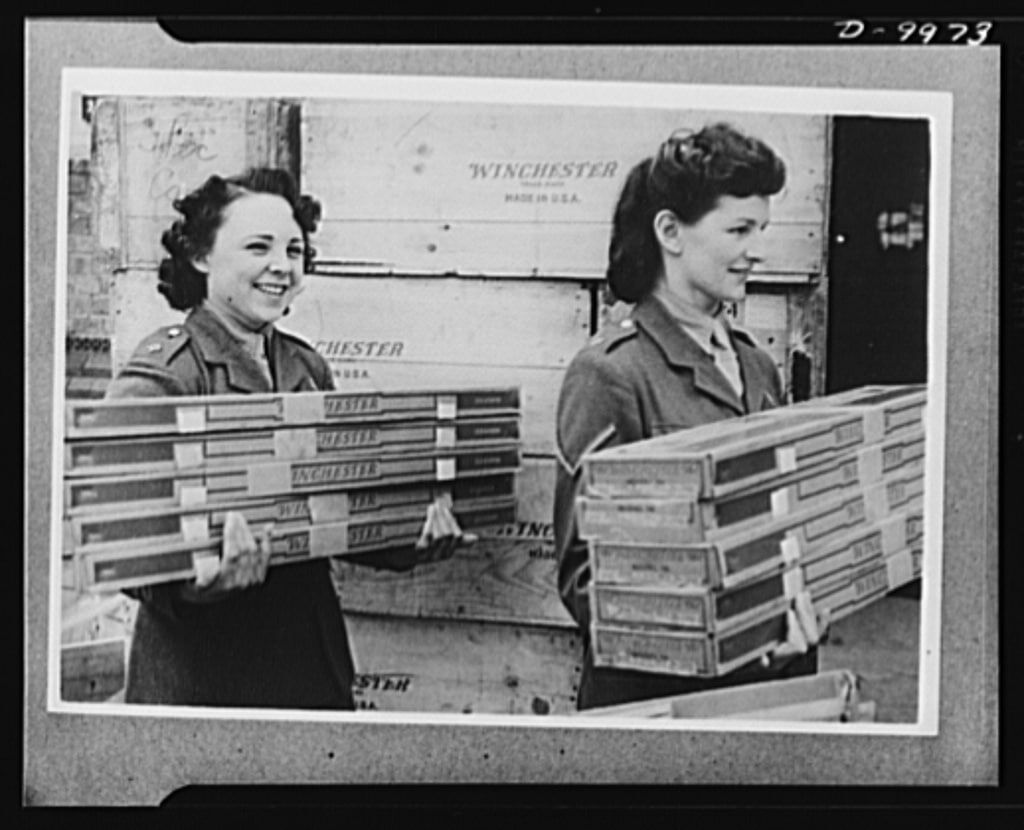 British women unload American rifles