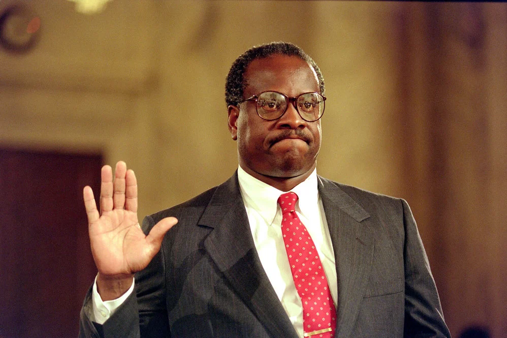 US Supreme Court nominee Clarence Thomas raises hi