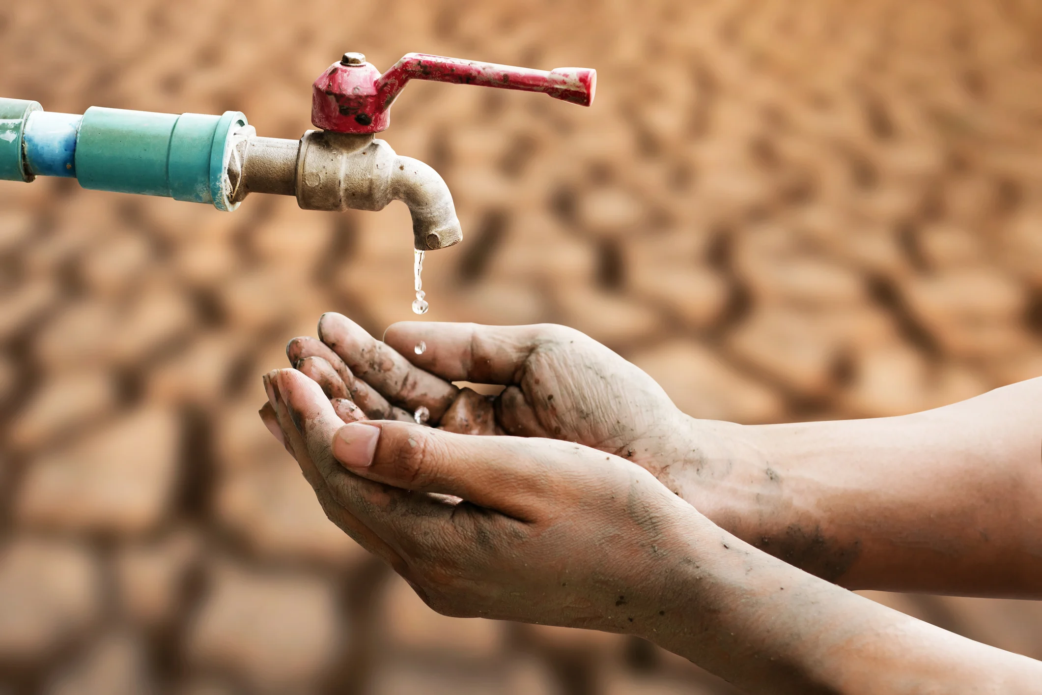 Water drips from a desert faucet
